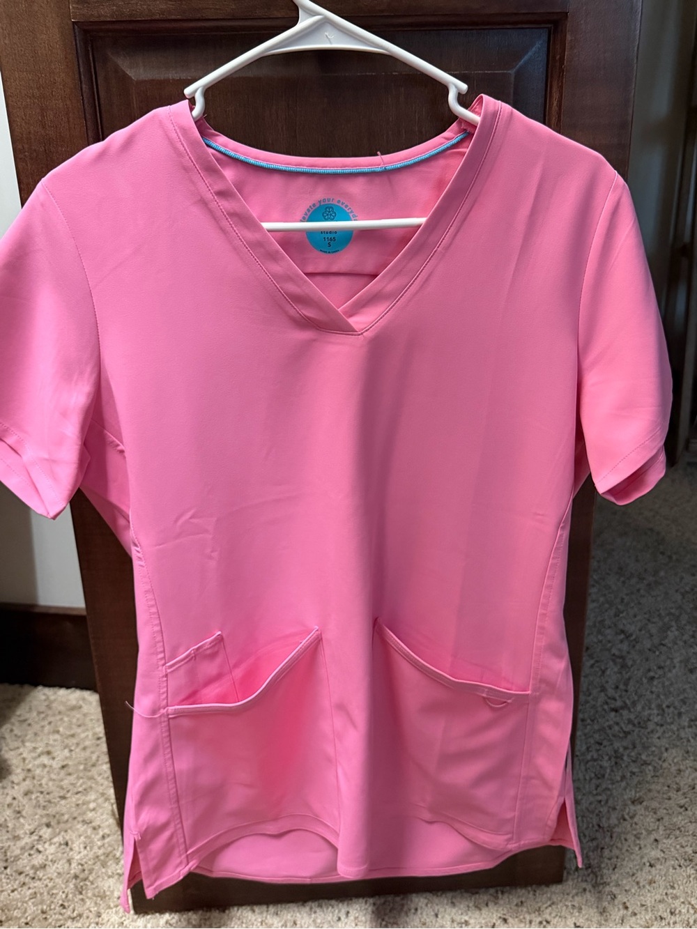 woman’s scrub top never worn before